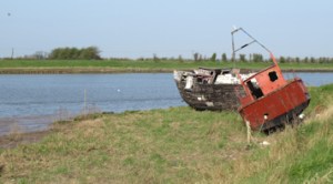 Wrecked boats, at mouth of the River Ouse