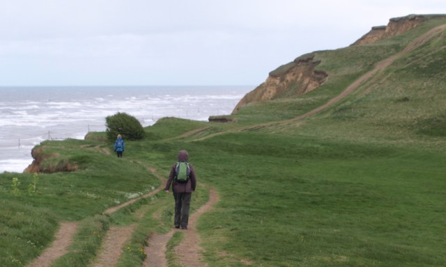 path up Skelding Hill, Ruth walking the Norfolk Coast Path