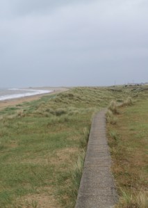 Leaving Caister along the sea wall - Ruth's coastal walk