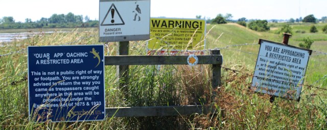 Signs warning of explosives - Ruths coastal walk UK