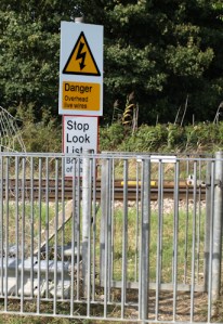 Crossing the railway line, Basildon, into Vange marshes.