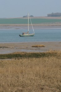 Boat and Isle of Sheppey beyond. Ruth's coastal walk.