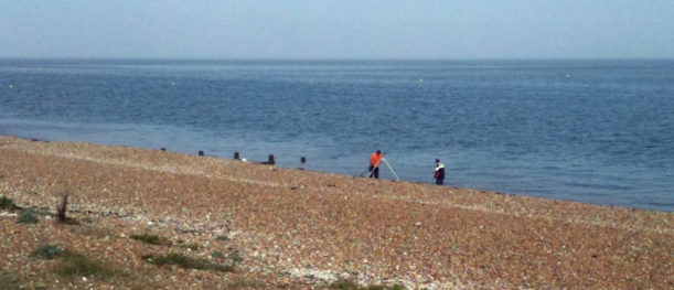 father and son fishing, near Whitstable, Kent. Ruths coastal walk.
