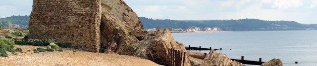 Crumbling Martello tower, Hythe beyond. Ruth's coastal walk.