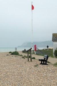 Red flag on Winchelsea Beach, Ruth's coastal walk.