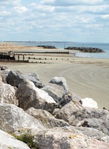 2 - Looking back to Littlehampton, breakwaters. Ruth on coast walk through Sussex.