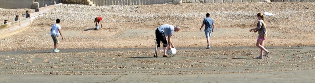 Constructing a maze on the beach, Ruth's coastal walk.