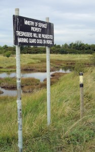 MoD warning signs, Ruth walks around the coast, Thorney Island.