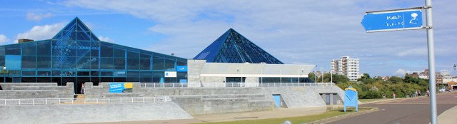 new development, Pyramids Centre, Portsmouth. Ruth walking round the coast.