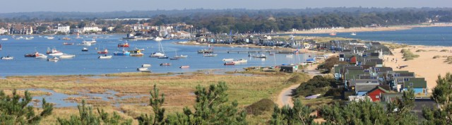 06 looking back to Christchurch Harbour, Ruth walking round the coast looking back to Christchurch Harbour, Ruth walking round the coast