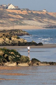 beach with jogger, Christchurch, Ruth's coast walk.