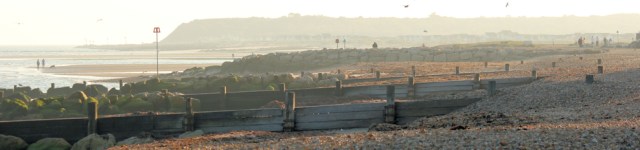 Looking towards Christchurch, late afternoon, Ruth on her coastal walk.