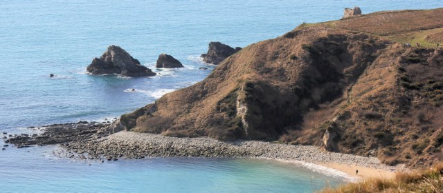 Mupe Rocks, Ruth walks along the South West Coast Path