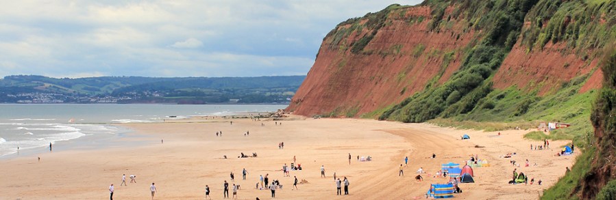 Sandy Beach, Ruth walking round the coast. Devon