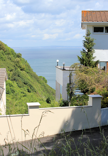 Coast path deviation, to Hope's Nose, Ruth walking the coastline