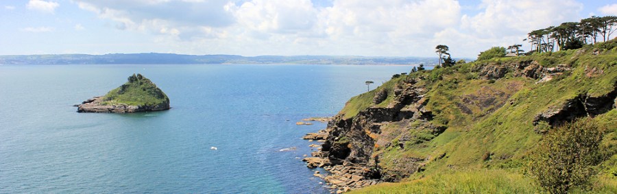 across Torbay from Hope's Nose, Ruth walks the South West Coast Path
