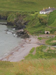 Man Sands, with stream, Ruth walks the coast of Devon