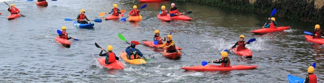 kids in kayaks, Brixham, Ruth walking the coastline