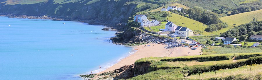 Hallsands - Ruth on her coastal walk. South West Coast Path, Devon.