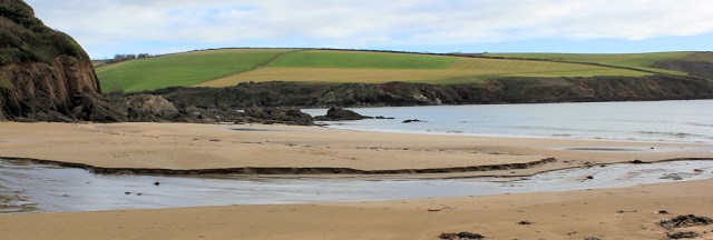 Mothecombe Beach, South West Coast Path, Ruth walking through Devon