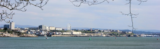 view back to Plymouth Hoe, Ruth walking round the coastline