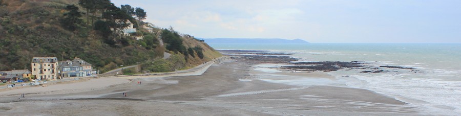 Ruth in Seaton, looking back to Rame Head