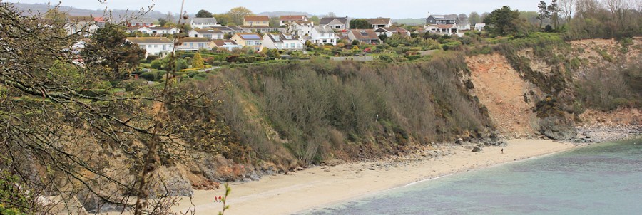 rockfalls, Duporth, Ruth walking the South West Coast Path