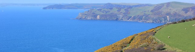 Pencarrow Head and Gribben Head, Ruth hiking the South West Coast Path