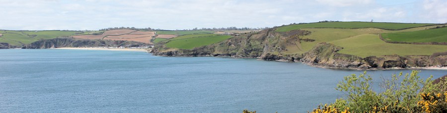 view to Pentewan, Ruth walking the coast of Cornwall