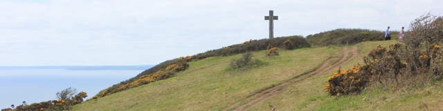 Cross at Dodman Point, Ruth walking around the Cornish Coast