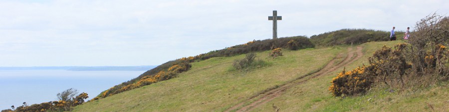 Cross at Dodman Point, Ruth walking around the Cornish Coast