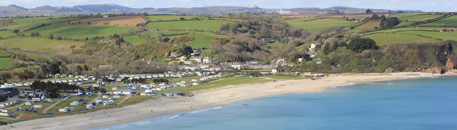 Pentewan Beach, Ruth walking the South West Coast Path