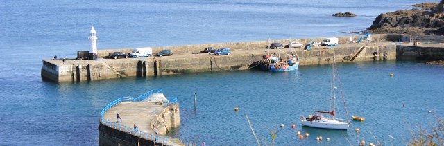 Ruth on South West Coast Path, looking down on Mevagissey Harbour