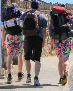 15 boys with bright shorts, overtaking Ruth Livingstone