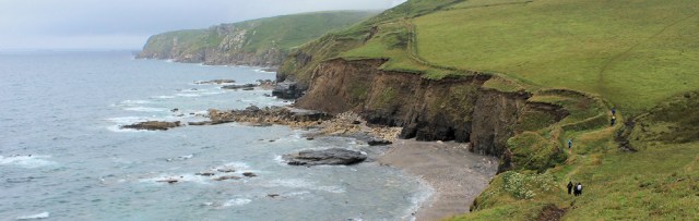 walkers overtake me, on South West Coast Path, Porthleven