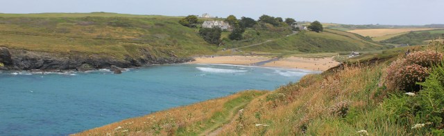 Poldhu Cove, Ruth on her coastal walk in Cornwall