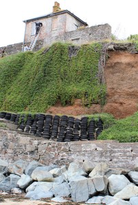 coastal erosion, Ruth on the South West Coast Path, Cornwall