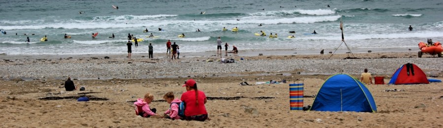 Porthtowan Beach, Ruth walking around the coast