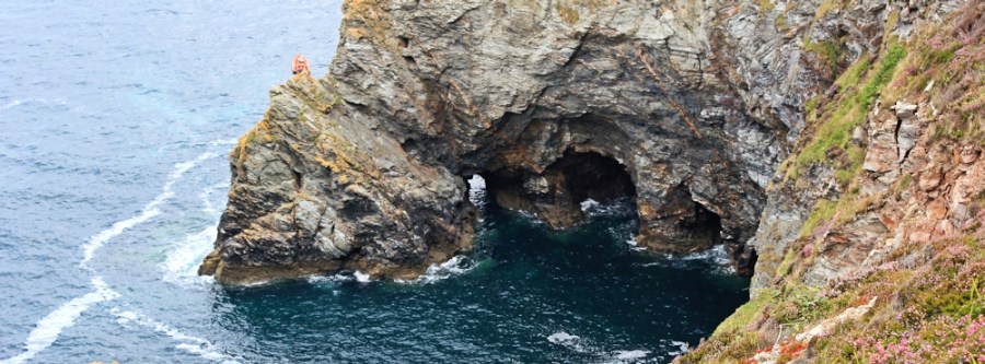 Caves, Newdowns Head, St Agnes, Ruth on her coastal walk around the UK