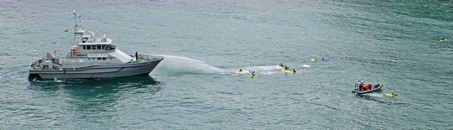 Spraying the surf boarders, St Agnes, Ruth Livingstone