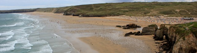 Perranporth Beach, Ruth walking the coast