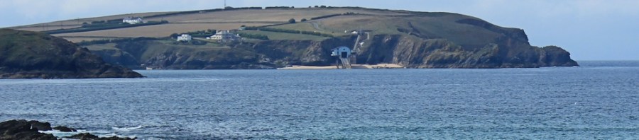 looking back to Mother Ivey's Bay, Ruth walking the coast of North Cornwall