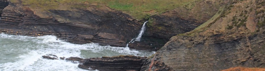waterfall Aller Shoot, Ruth walking the coast of North Cornwall