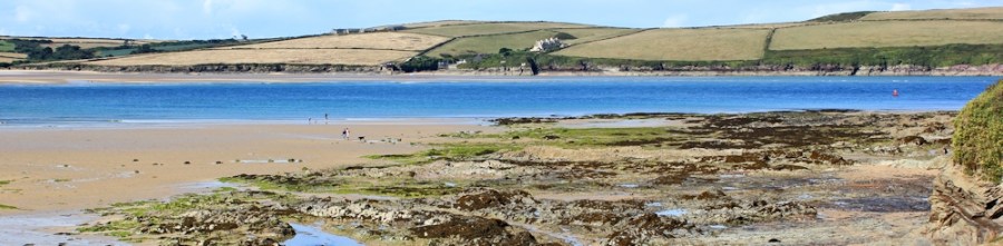 across Doom Bar to Harbour Cove, Padstow, Ruth walkling the SWCP