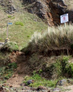 up a crumbling cliff, Ligger POint, Ruth's coastal walk