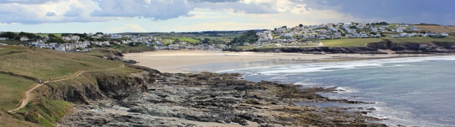 walking out of Polzeath, Cornwall, Ruth on the South West Coast Path