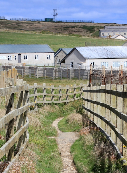 walking through Penhale Camp, Ruth on SWCP