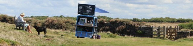 Coffee van, near Dinas Head, Ruth walking the coast