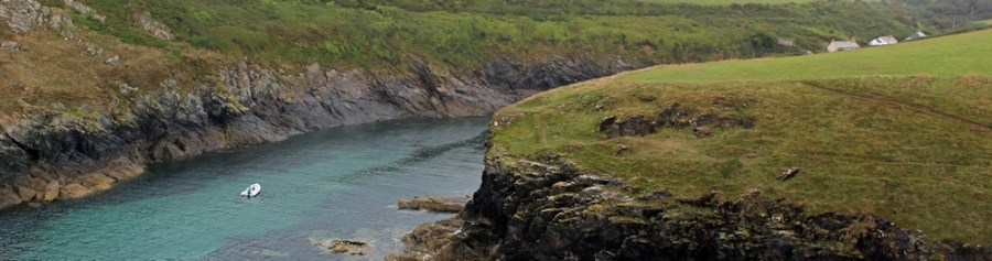 into Port Quin, Ruth walking the coast, Cornwall SWCP