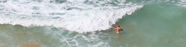 nude surfboarder, Carnewas, North Cornwall